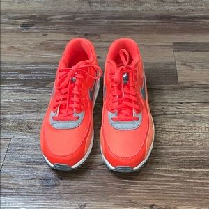 Orange Nike sneakers